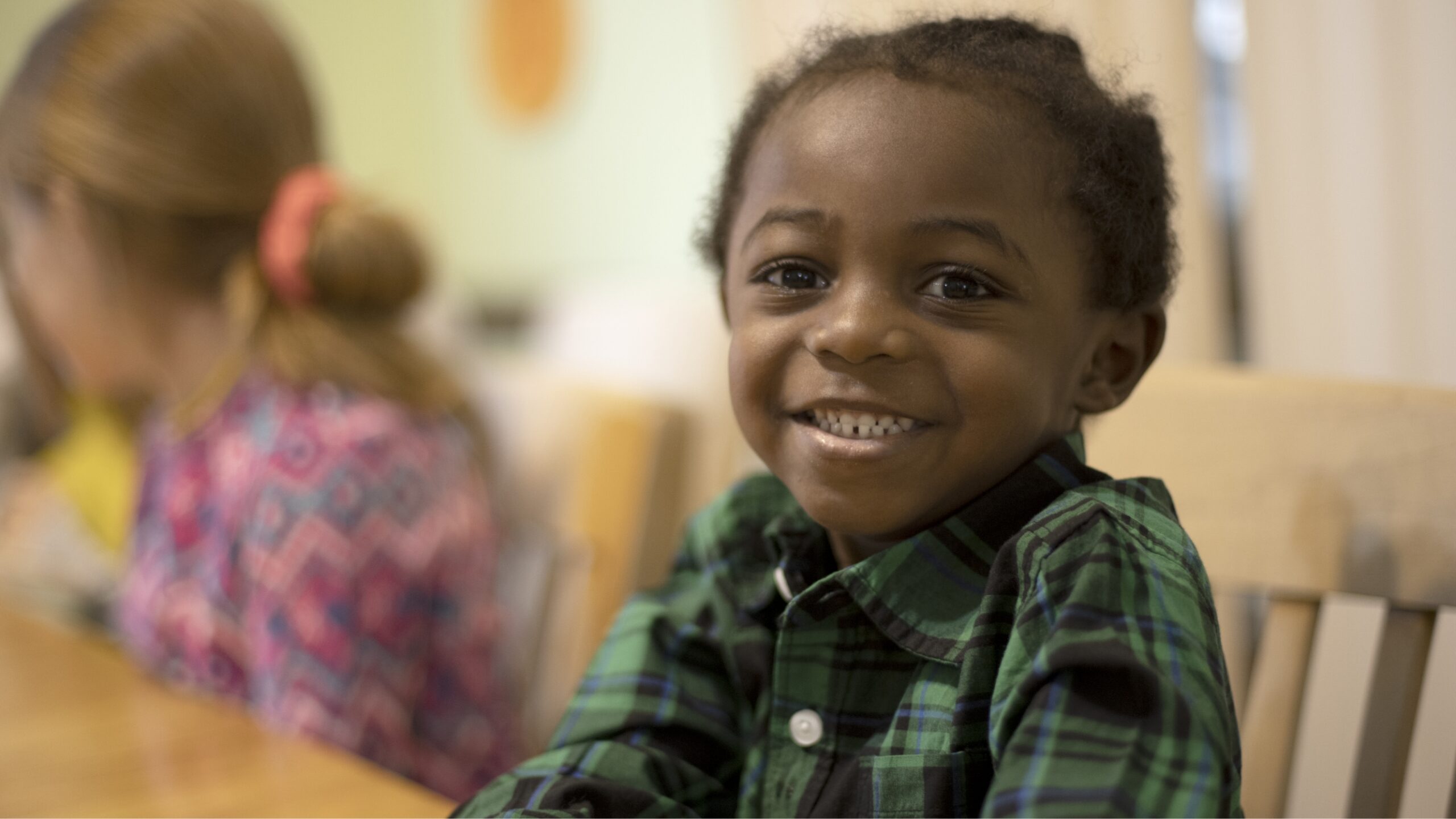 little boy smiling at camera