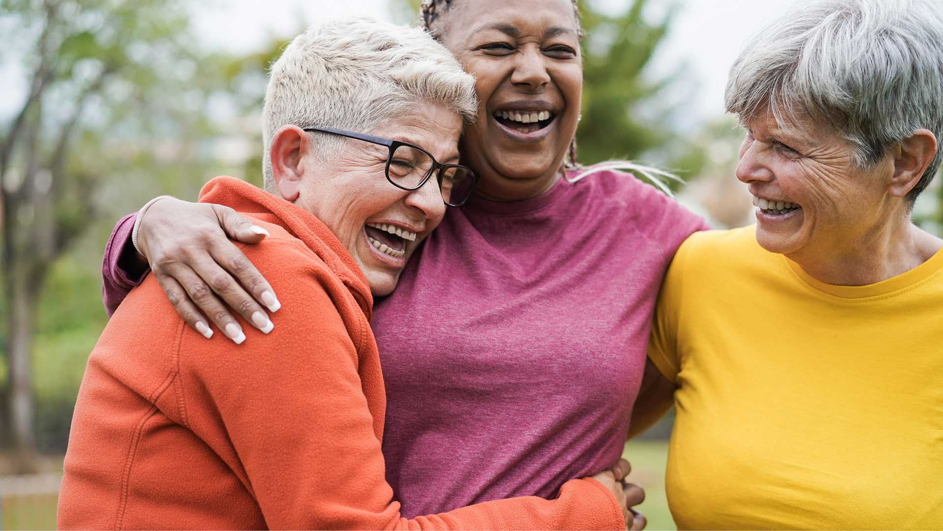 three friends embracing