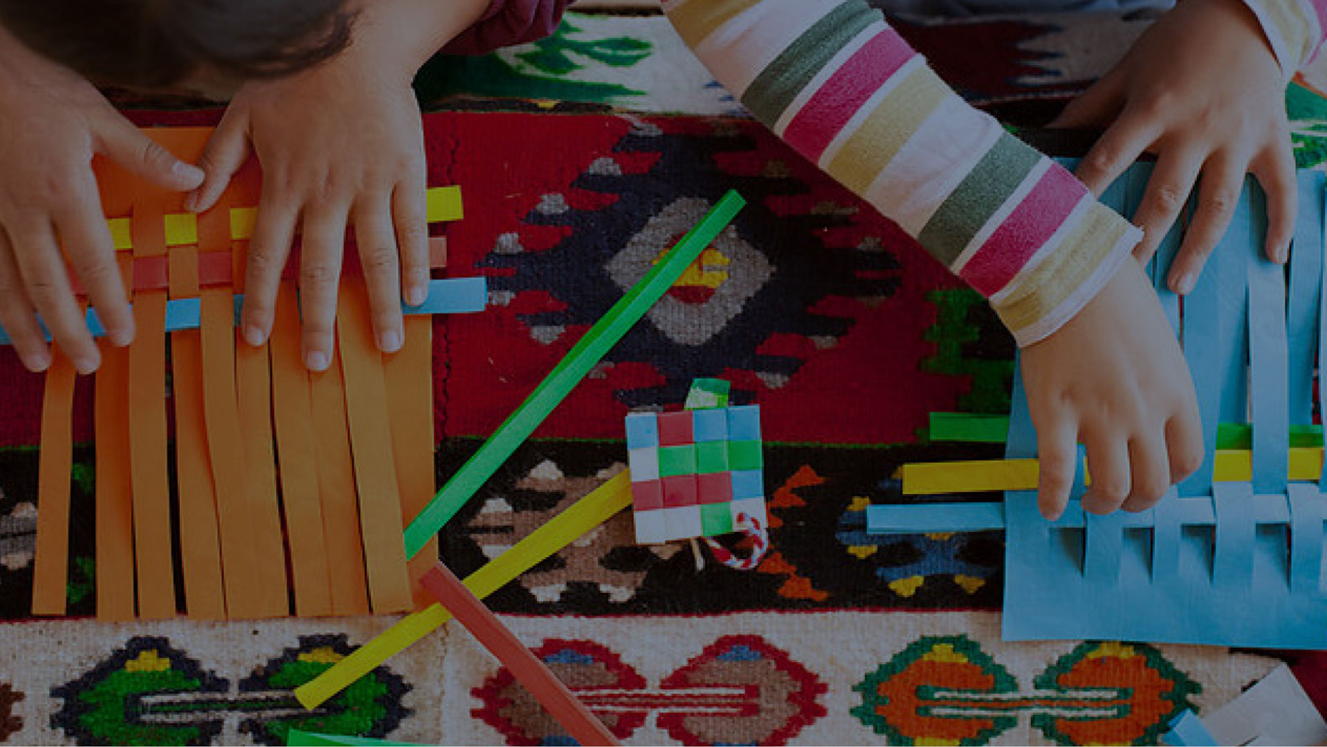 top view of children doing crafts