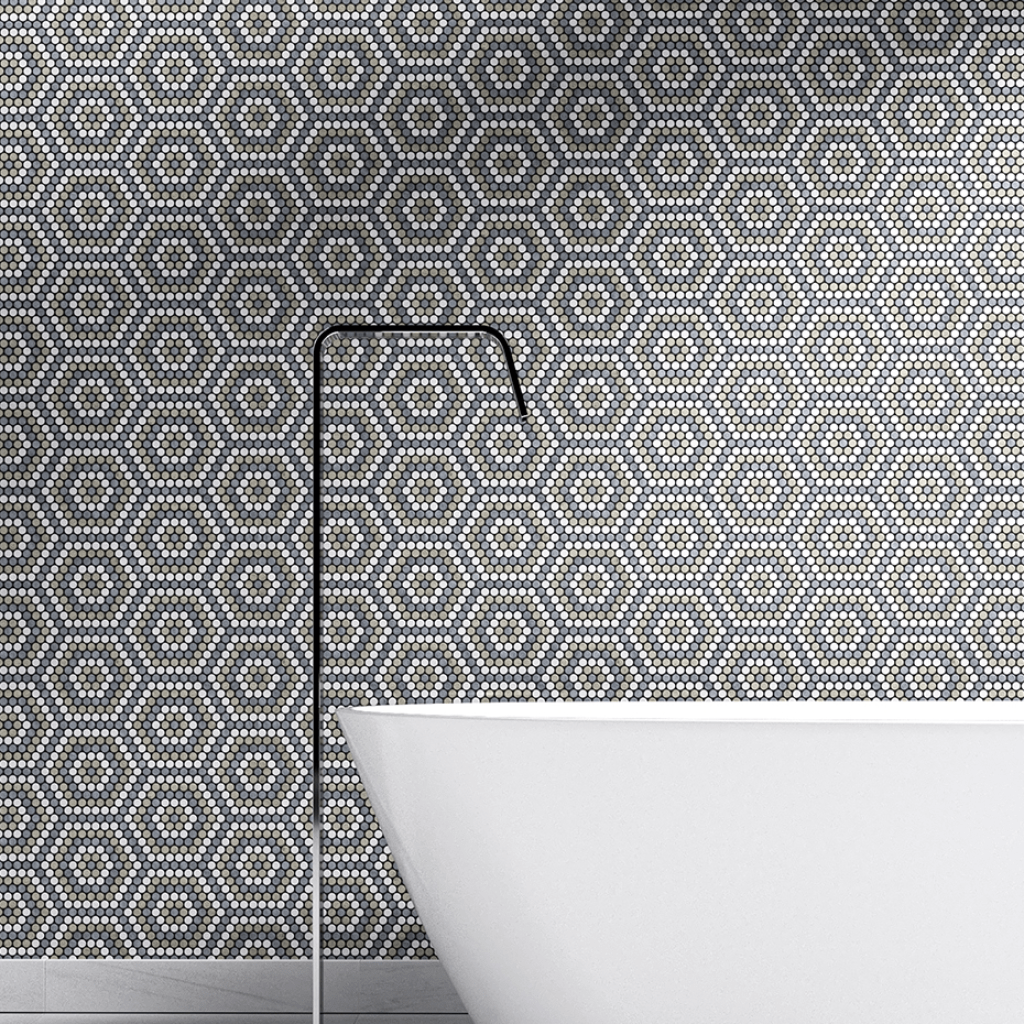 white bathtub with patterned wallpaper